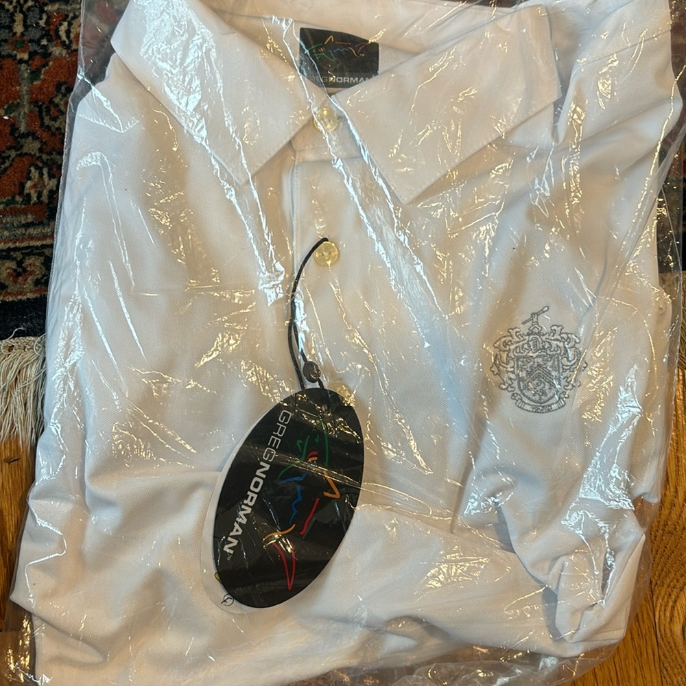 Greg Norman white polo
